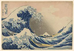 Katsushika Hokusai Ukiyo-e woodblock print, "The Great Wave off Kanagawa." A monumental, curling wave crests violently, its claw-like foam threatening three long, slender fishing boats caught in the trough below.