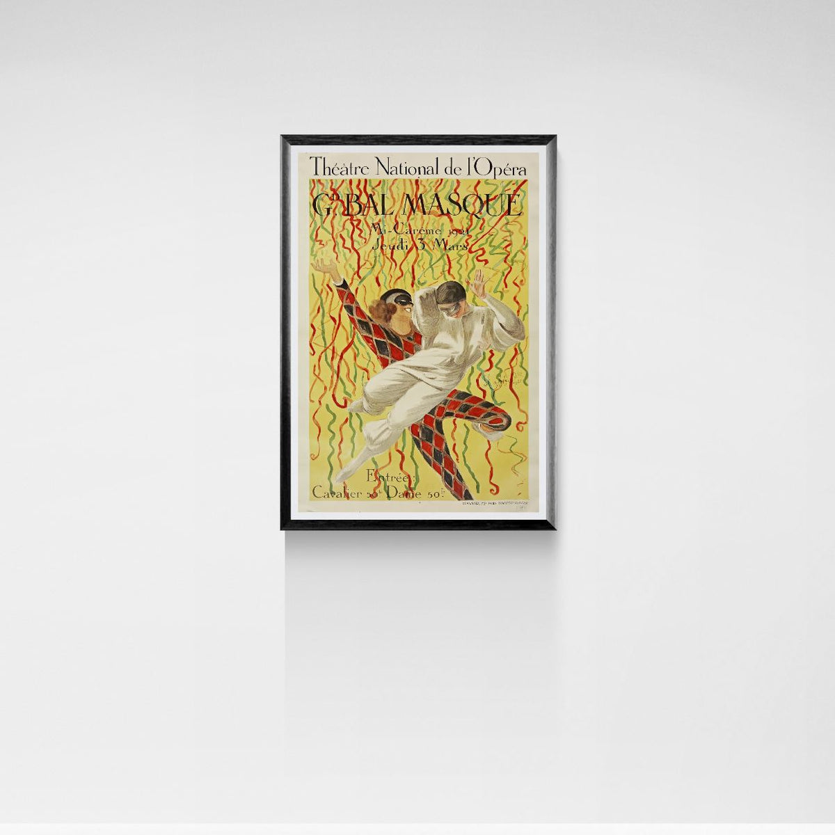 Framed poster of a dancer and a woman in a red dress on a white wall