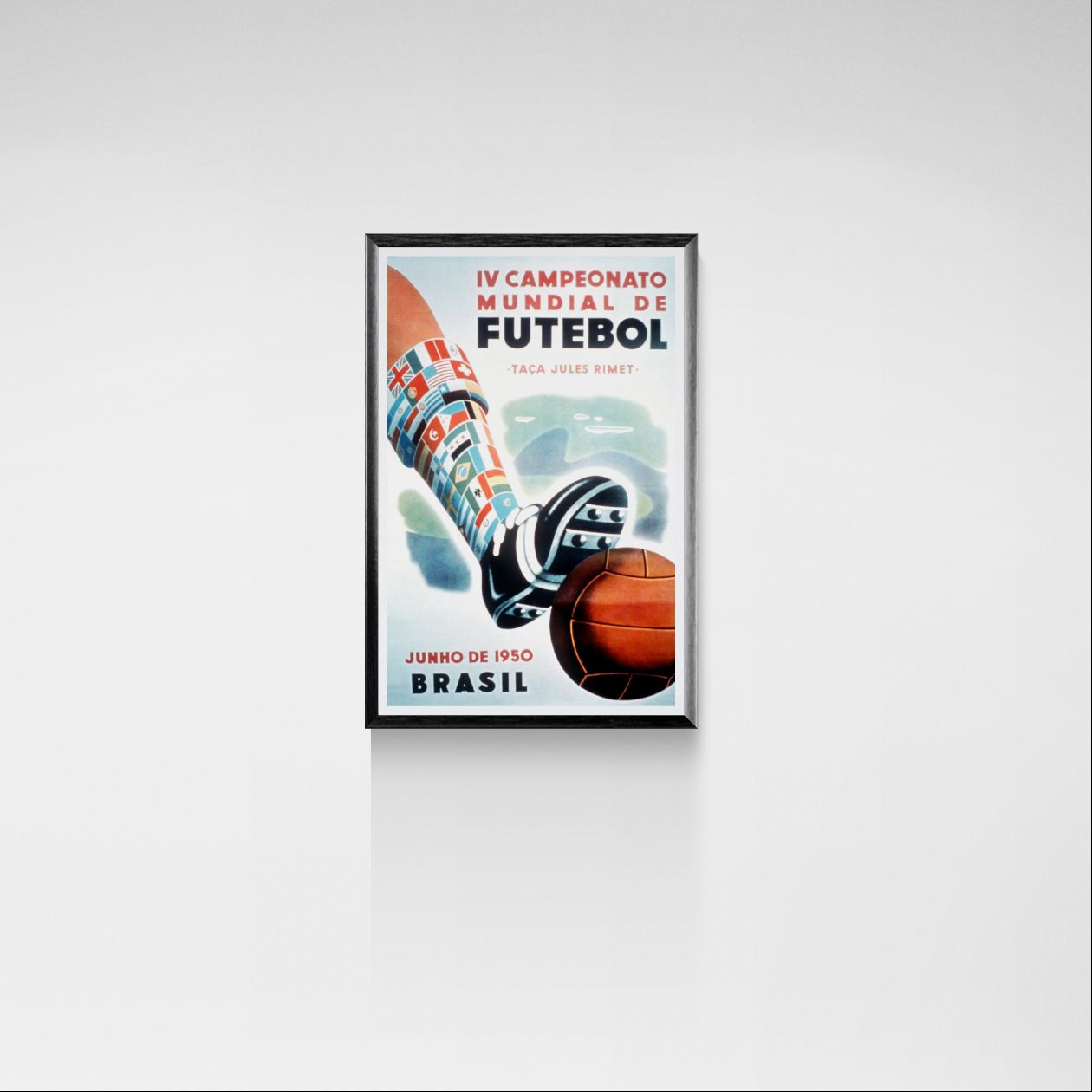 Framed poster of a soccer-themed design on a white wall