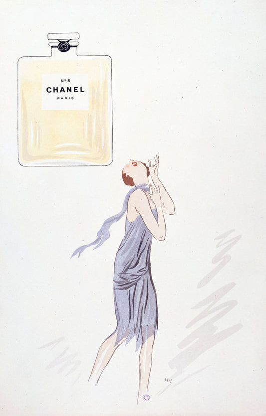 Chanel No. 5 perfume bottle with a woman in a lavender dress on a white background