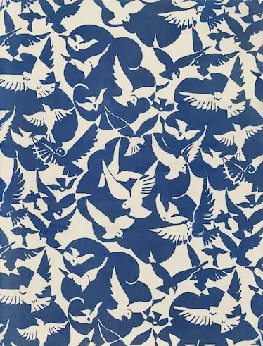 Pattern of blue and white birds on a fabric background