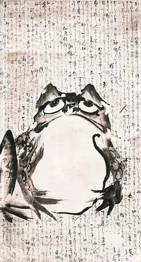 Traditional ink painting of a frog on textured paper with Japanese calligraphy