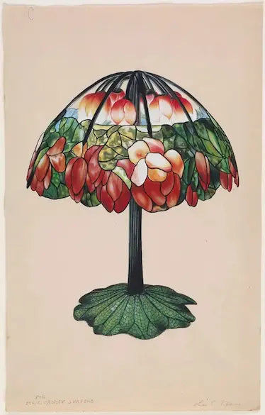 Decorative lamp with stained glass shade featuring floral design on a beige background