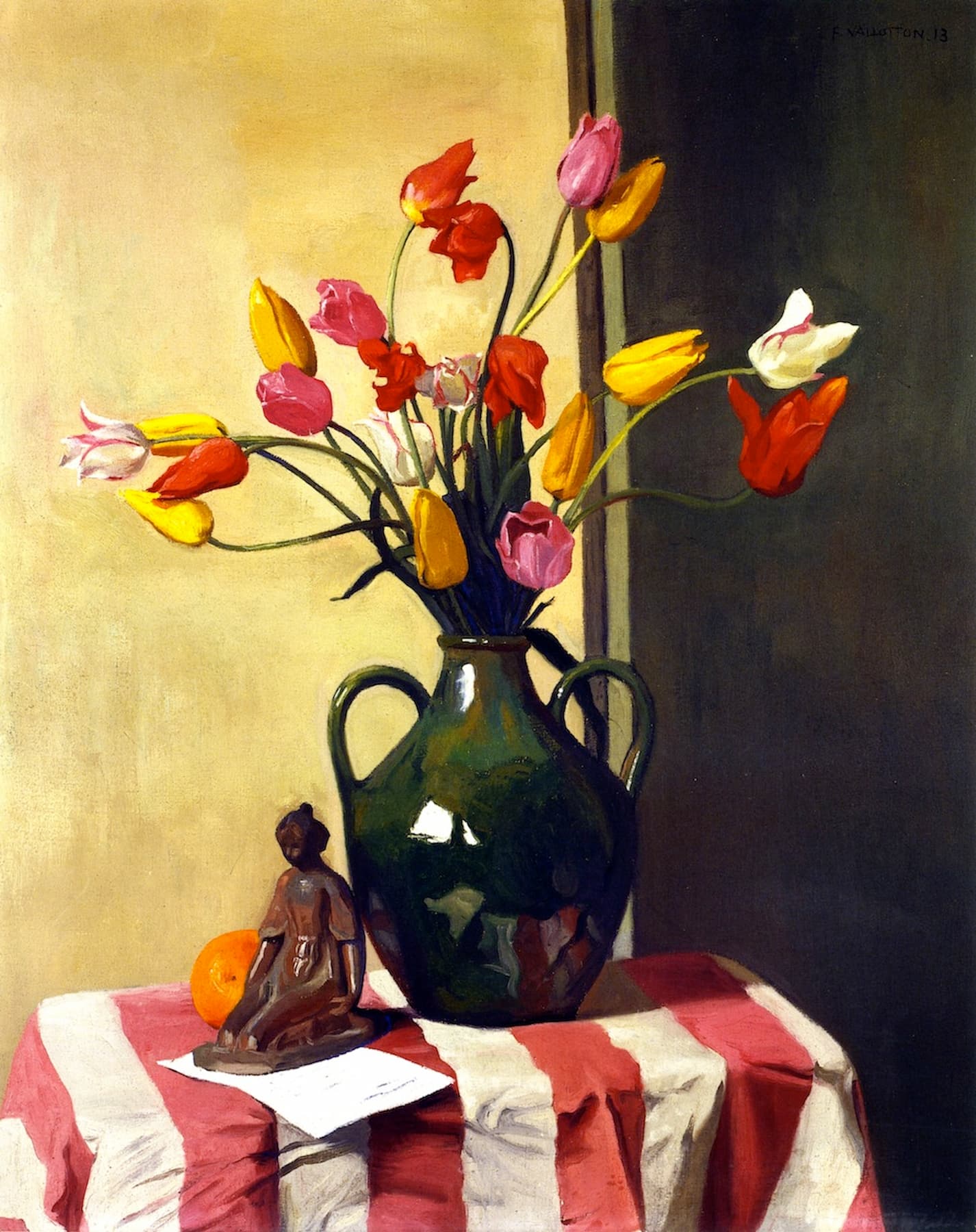 Still life painting with a vase of colorful tulips and a small statue on a striped cloth.