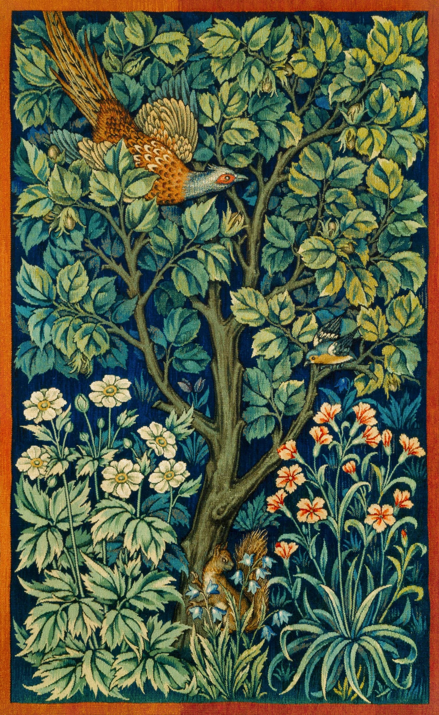 Tapestry with a bird perched on a tree branch surrounded by flowers and leaves.