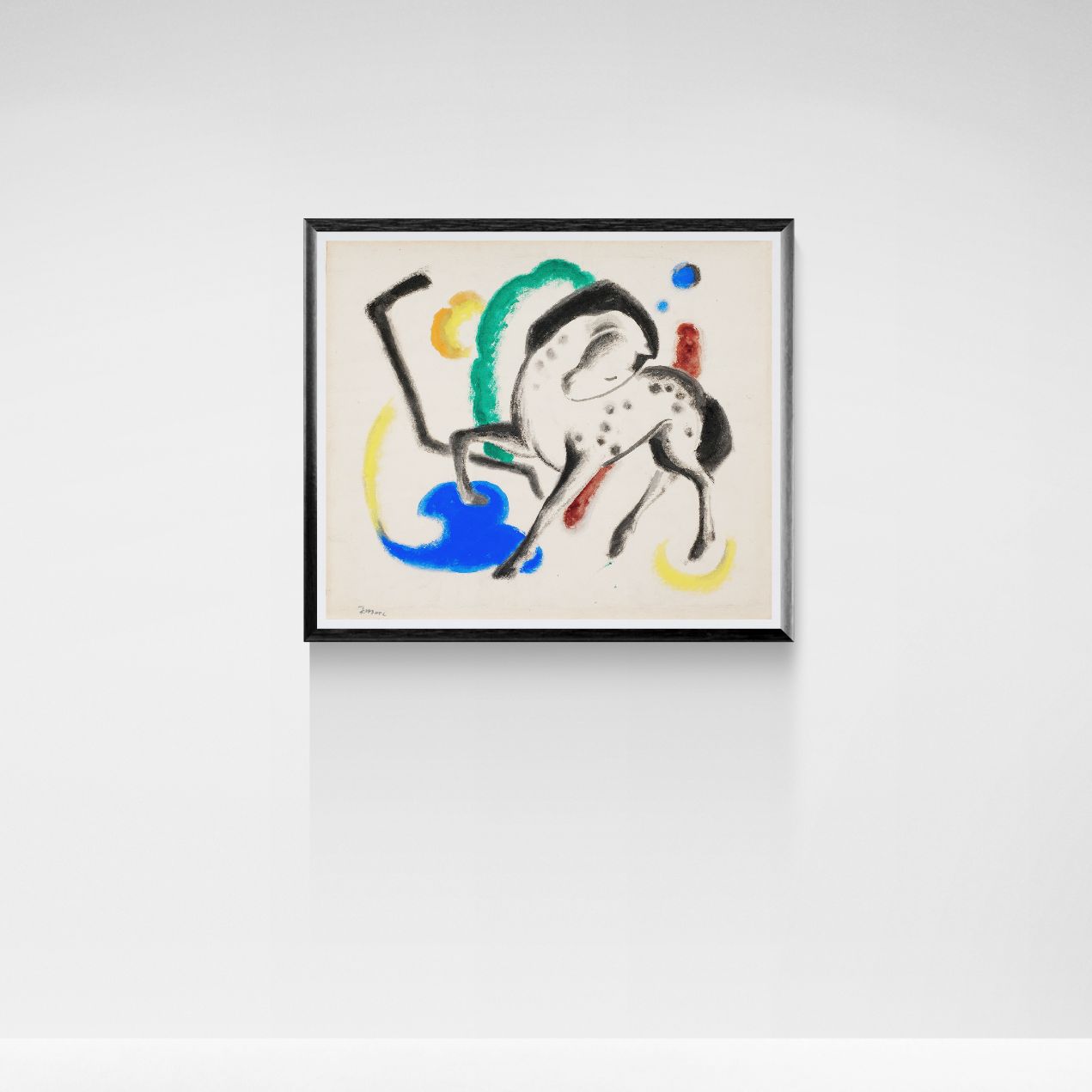 Framed abstract artwork on a white wall