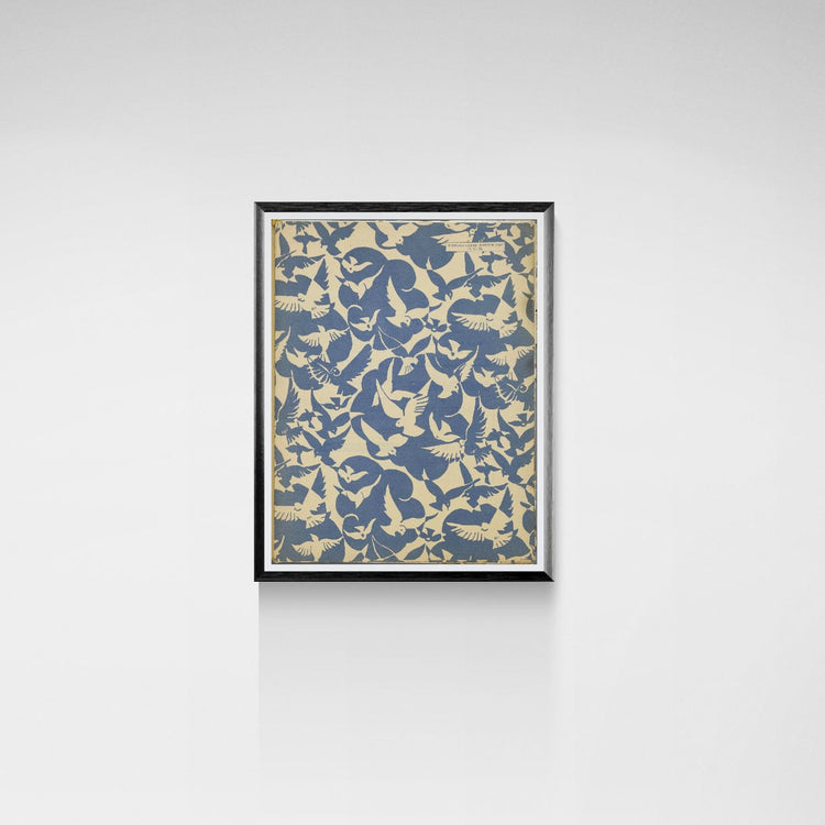 Framed artwork with a pattern of birds on a white wall