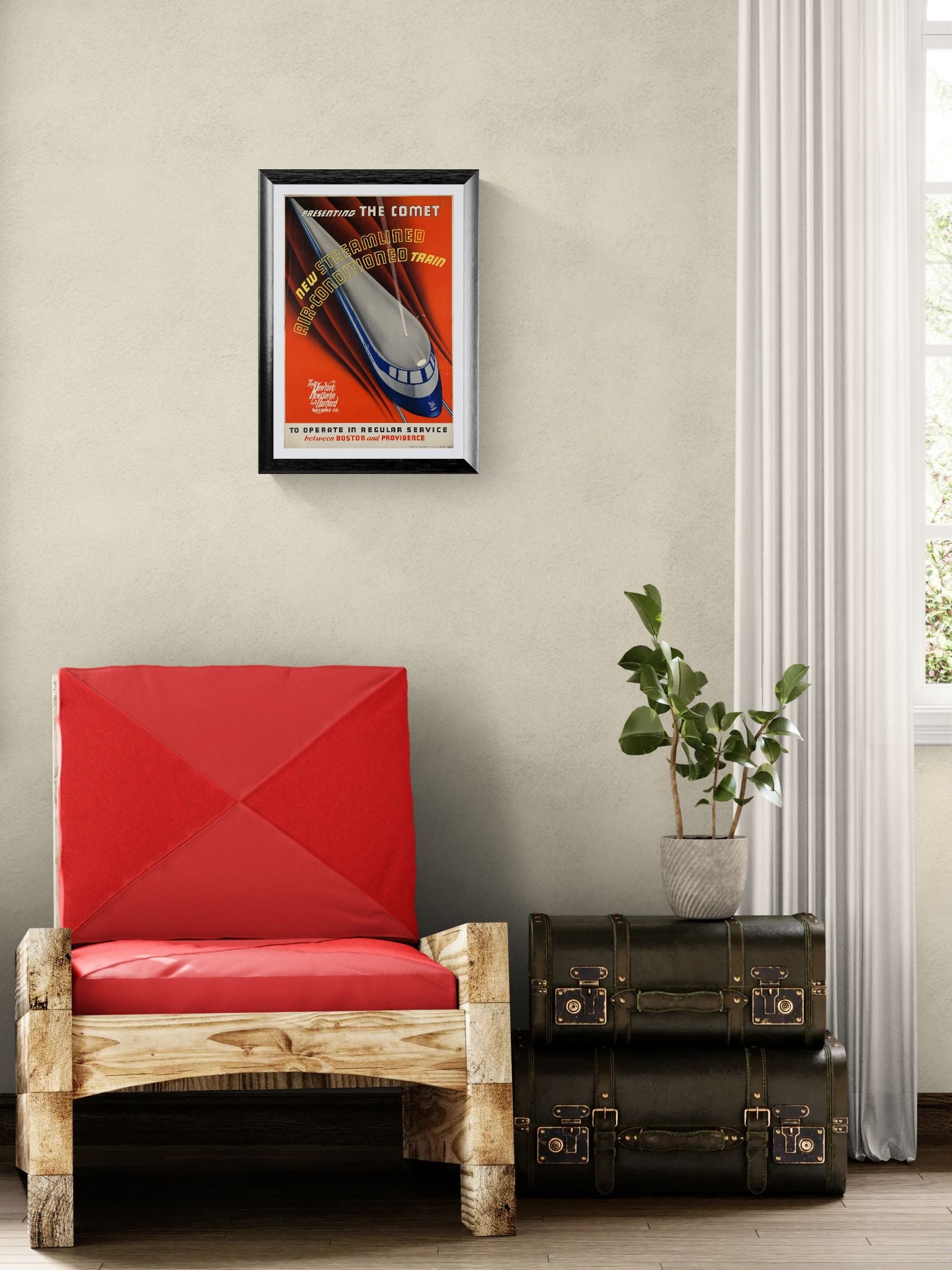 Red chair with a vintage-style poster on the wall, next to a black suitcase and a plant.