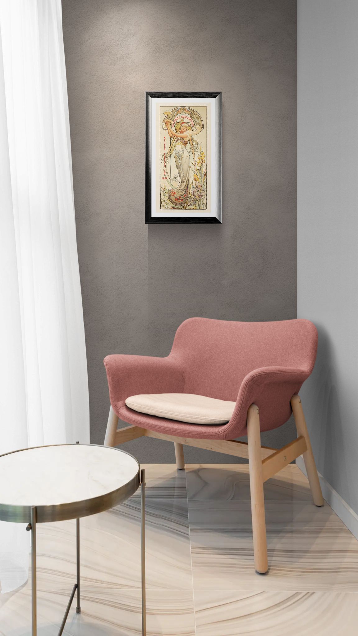 Pink chair with beige cushion in a room with a framed picture on the wall.