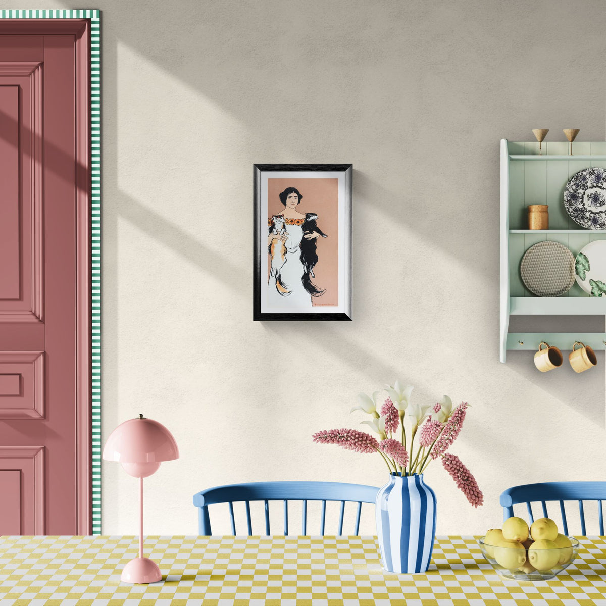 Dining room with a table, chairs, lamp, and decorative items on a wall.