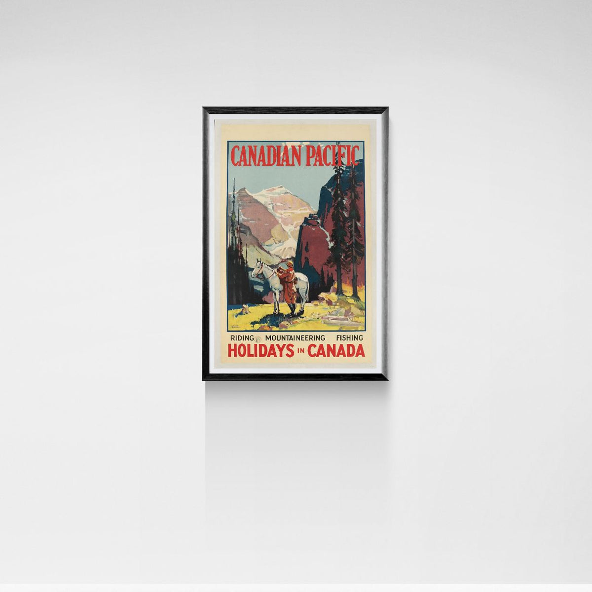Framed Canadian Pacific travel poster on a white wall