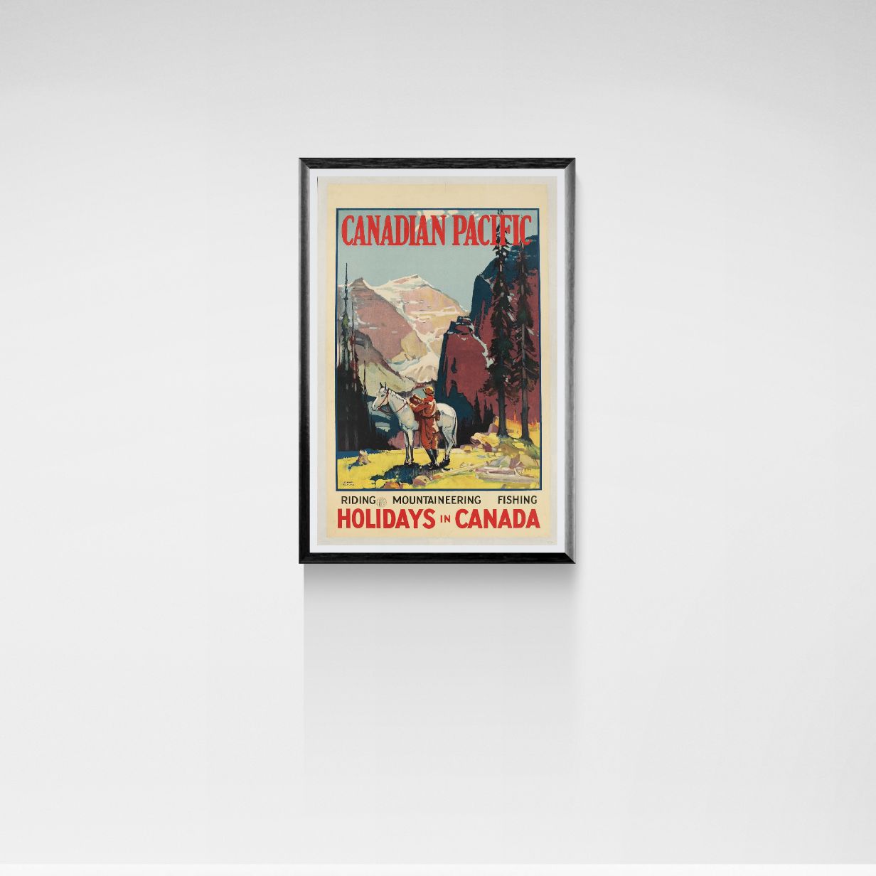 Framed Canadian Pacific travel poster on a white wall