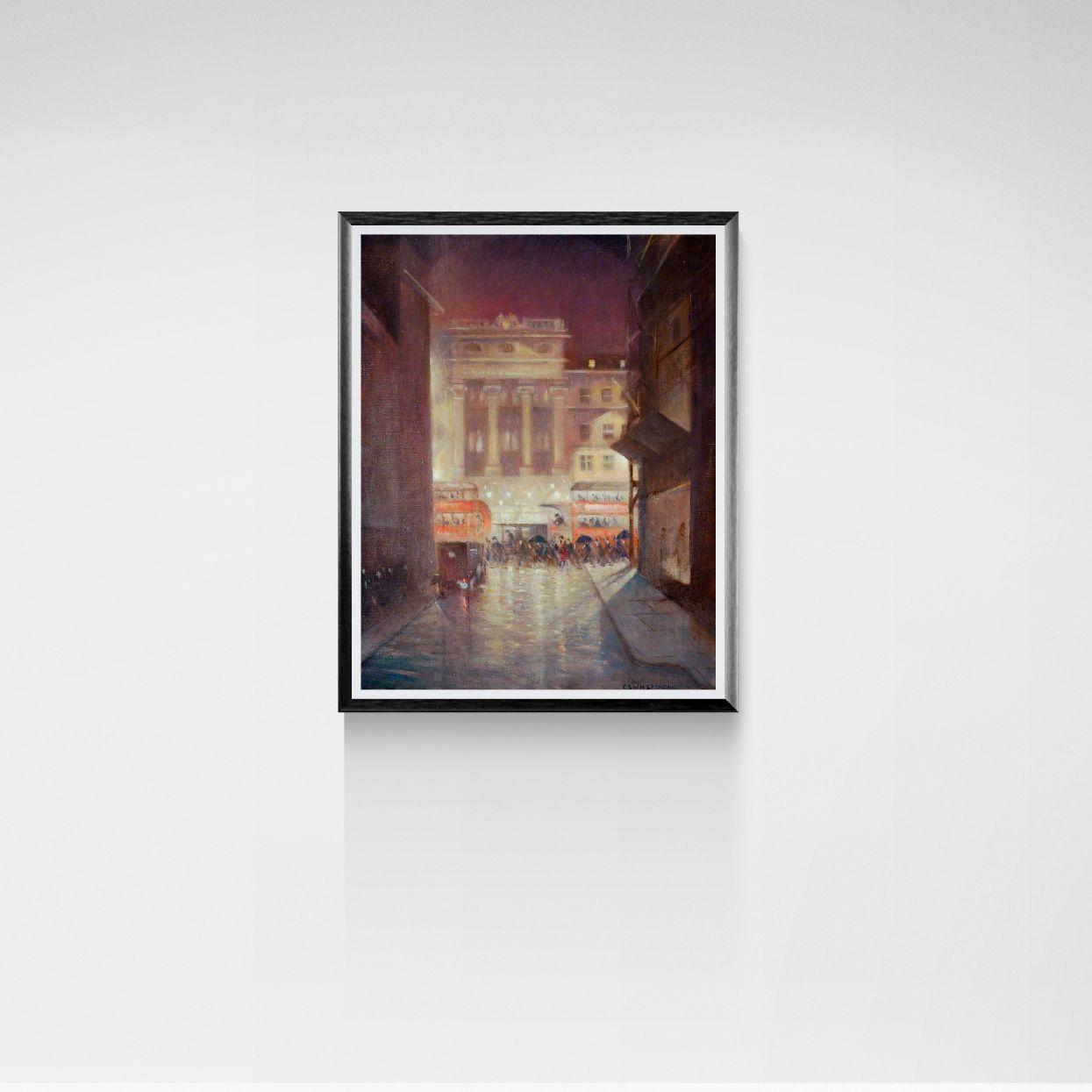 Framed painting of a London city street scene on a white wall