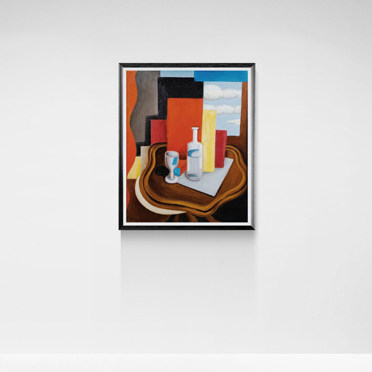 Framed abstract painting on a white wall