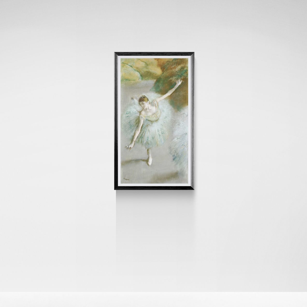 Framed artwork of a dancer on a white wall