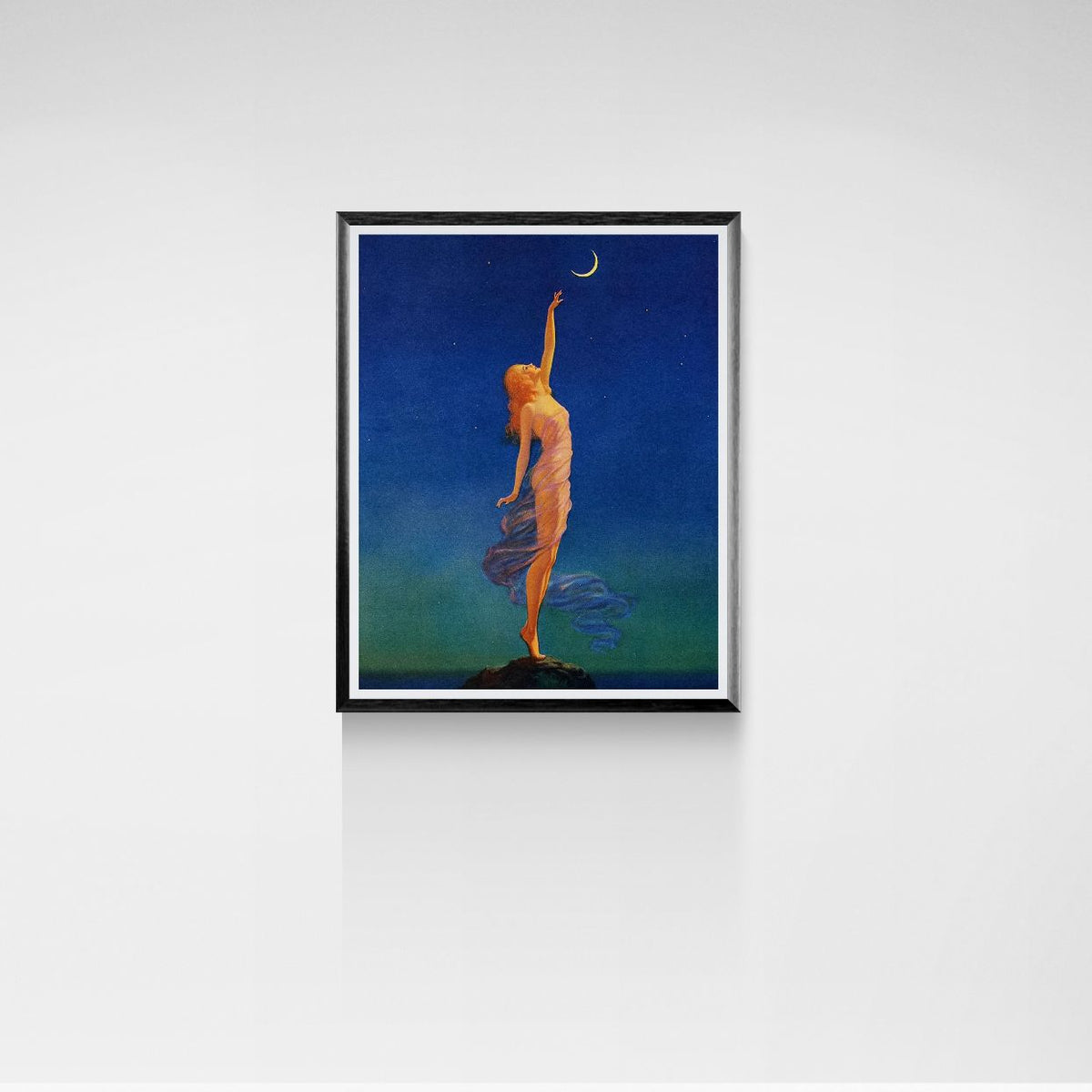 Framed artwork of a woman reaching for the moon against a blue sky.