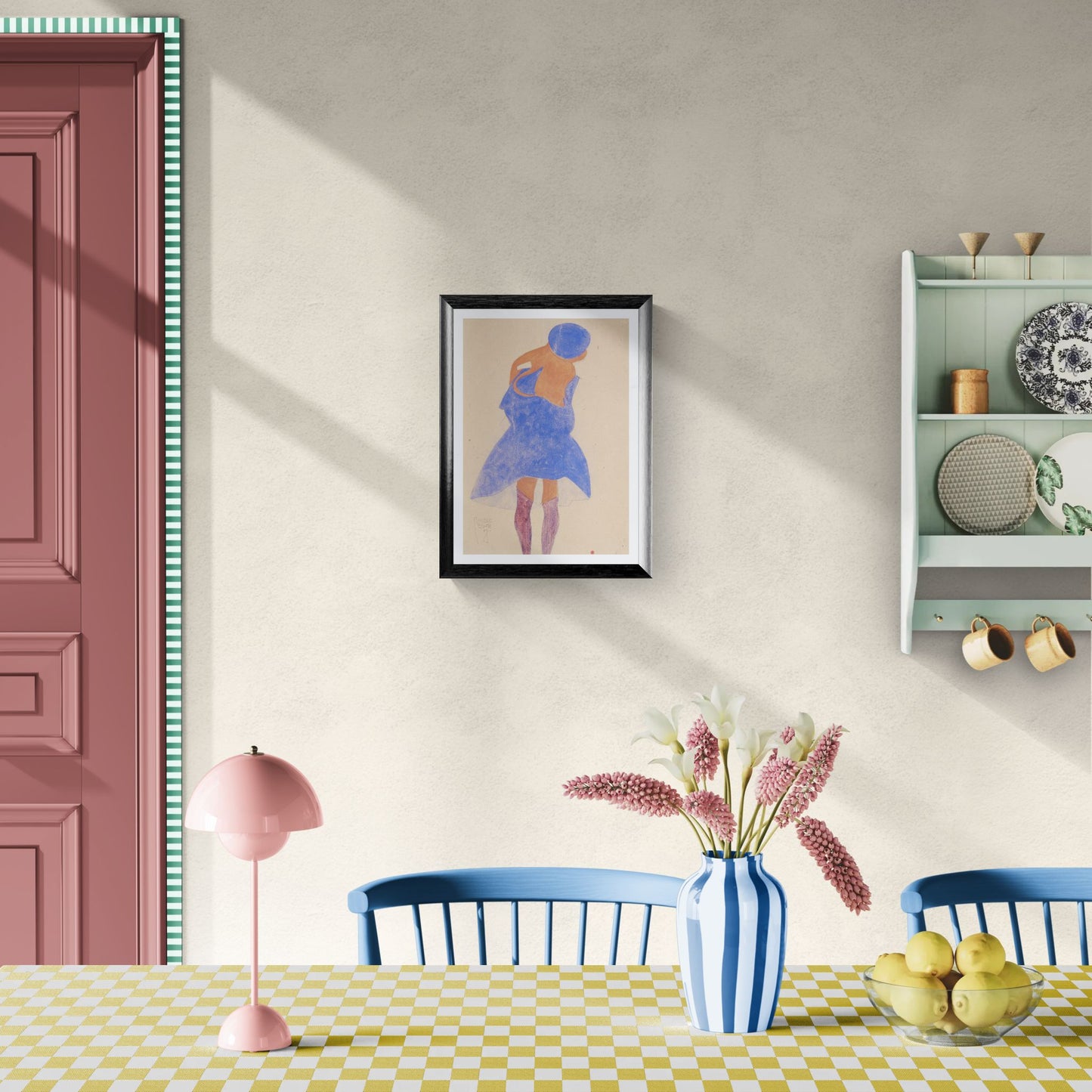 Dining room with a table, chairs, lamp, and wall art.