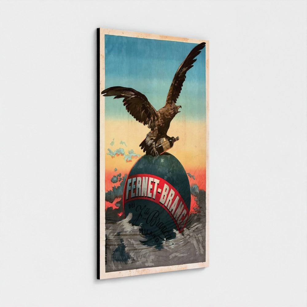 A vertical rectangular wall art print or poster showing an eagle perched on a globe with the text 'FERNET-BRANDE' and vintage-style sky colors, displayed against a light gray background.