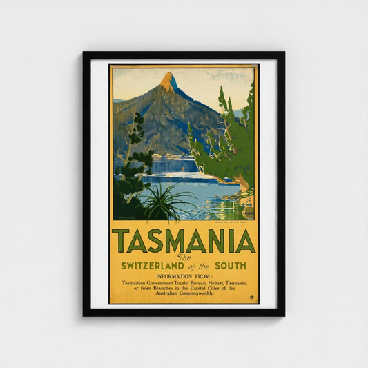 Framed travel poster for Tasmania featuring a mountain and lake.