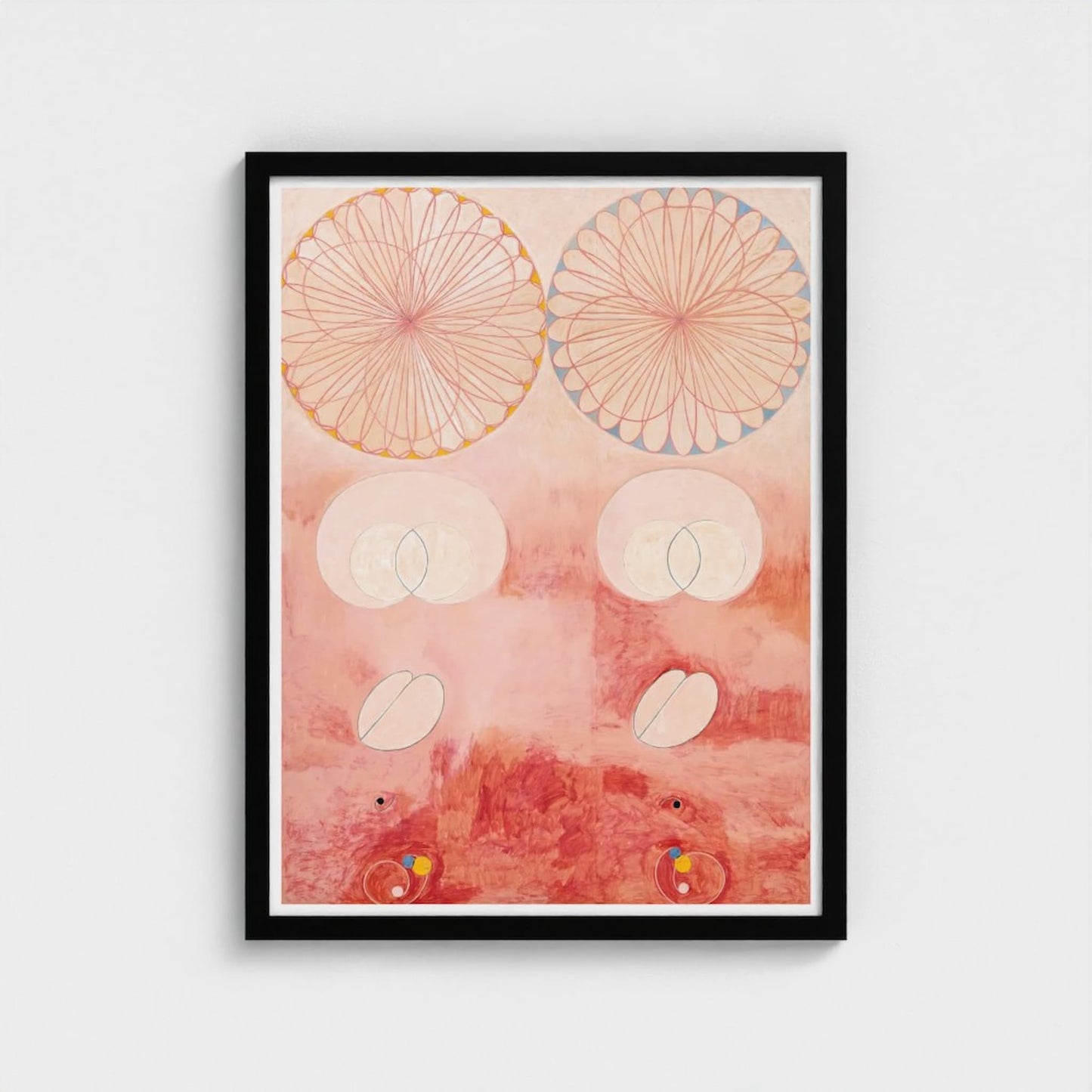 Framed abstract art print with geometric shapes on a pink background