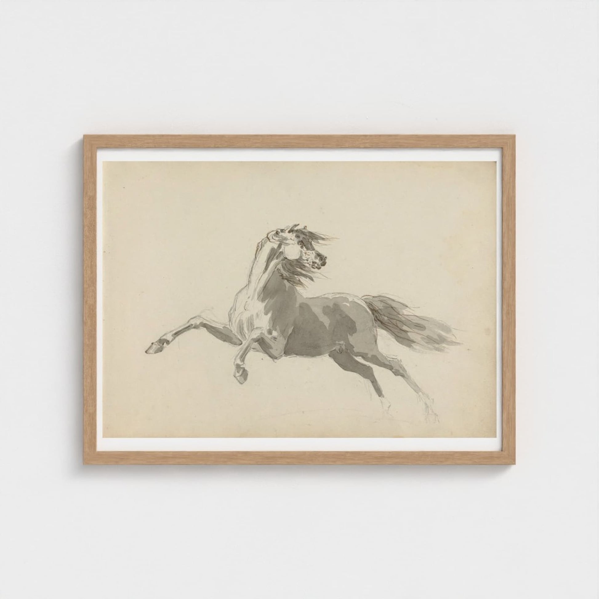 Framed artwork of a silver teapot on a wooden surface with a neutral background