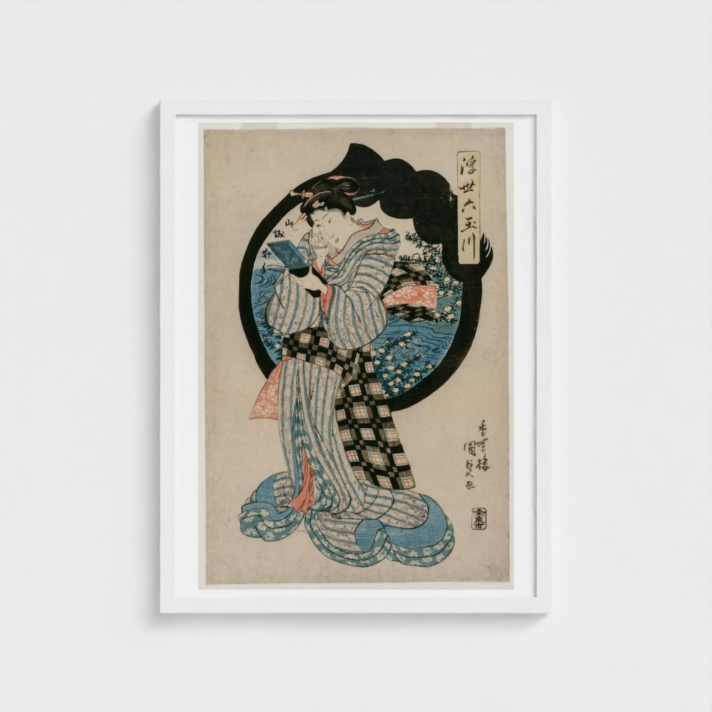 Framed artwork of a traditional Japanese print with a person in a kimono on a beige background