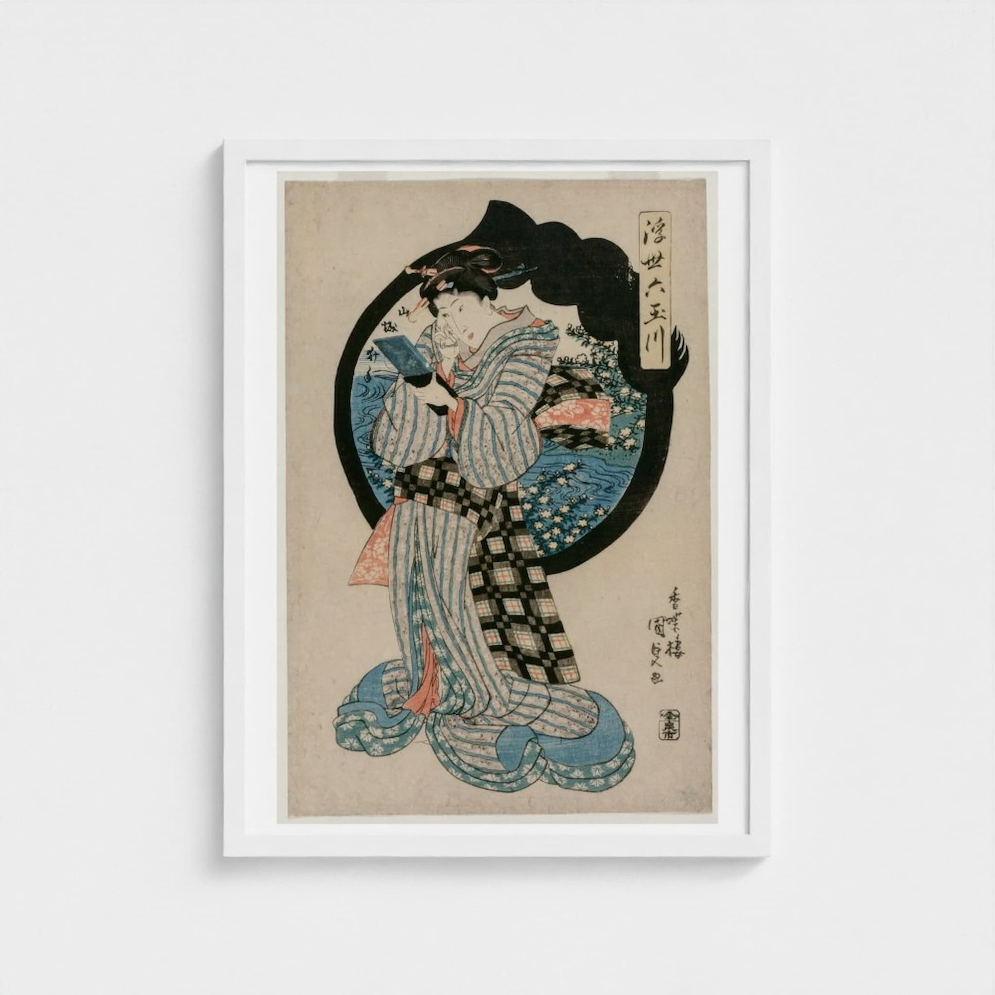 Framed artwork of a traditional Japanese print with a person in a kimono on a beige background