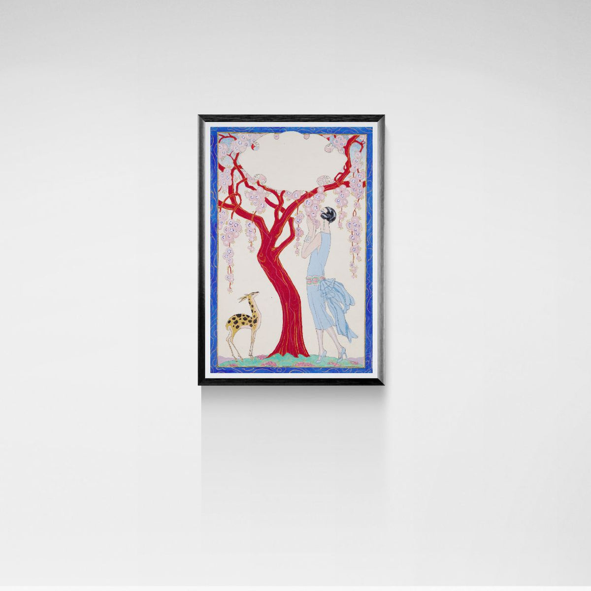 Framed artwork with a red tree and blue dress on a white wall