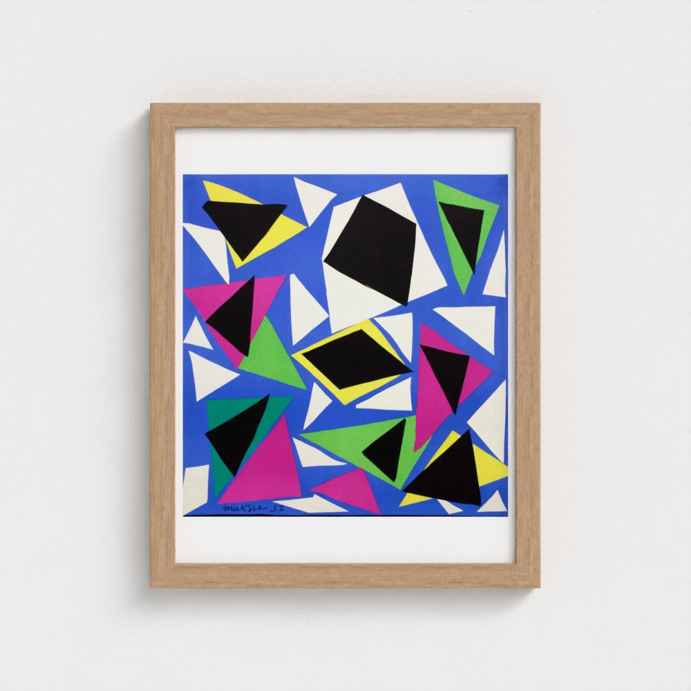 Framed abstract art print with colorful geometric shapes on a white background