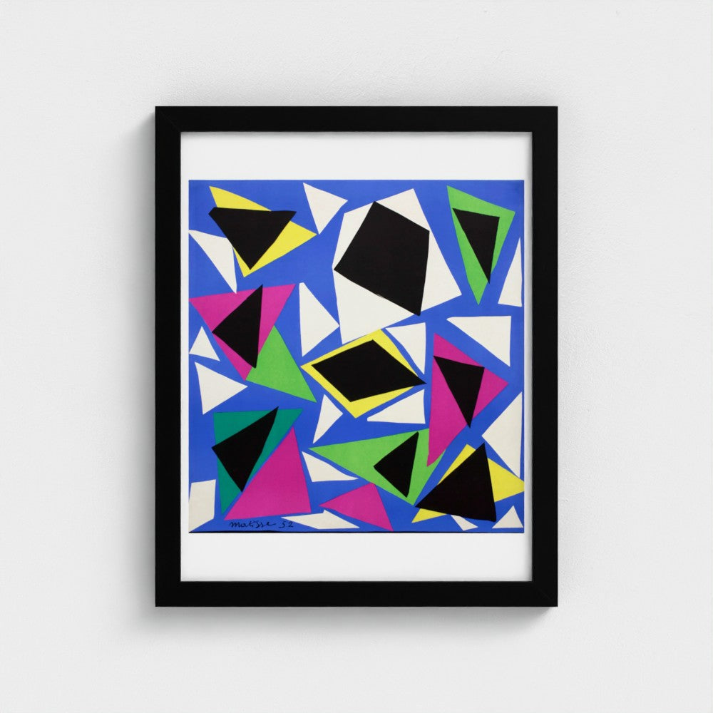 Framed abstract art print with colorful geometric shapes on a white background