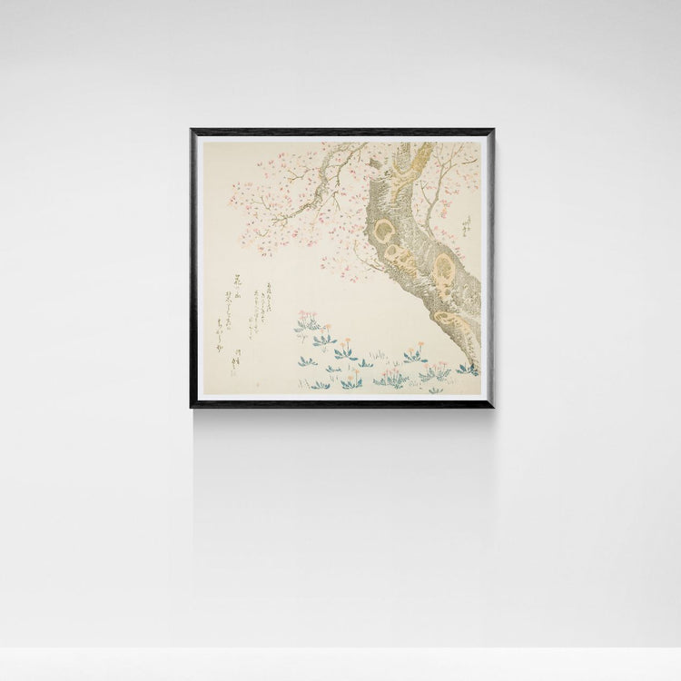 Framed Japanese cherry blossom art piece on a white wall