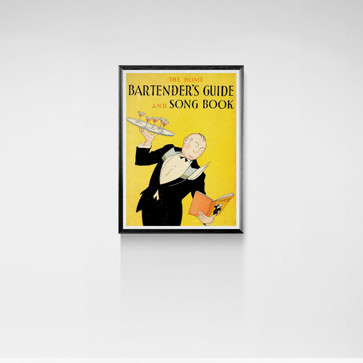 Framed poster of 'The Home Bartender's Guide and Song Book' with a man in a tuxedo holding a tray and book on a yellow background.