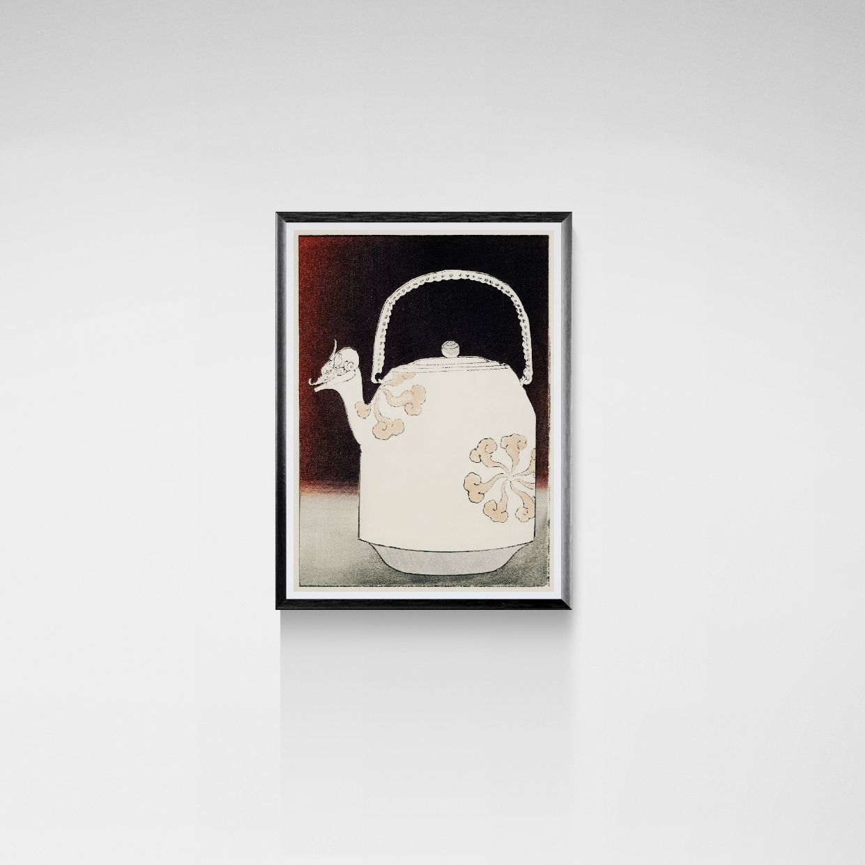 Framed artwork of a teapot with floral designs on a white background