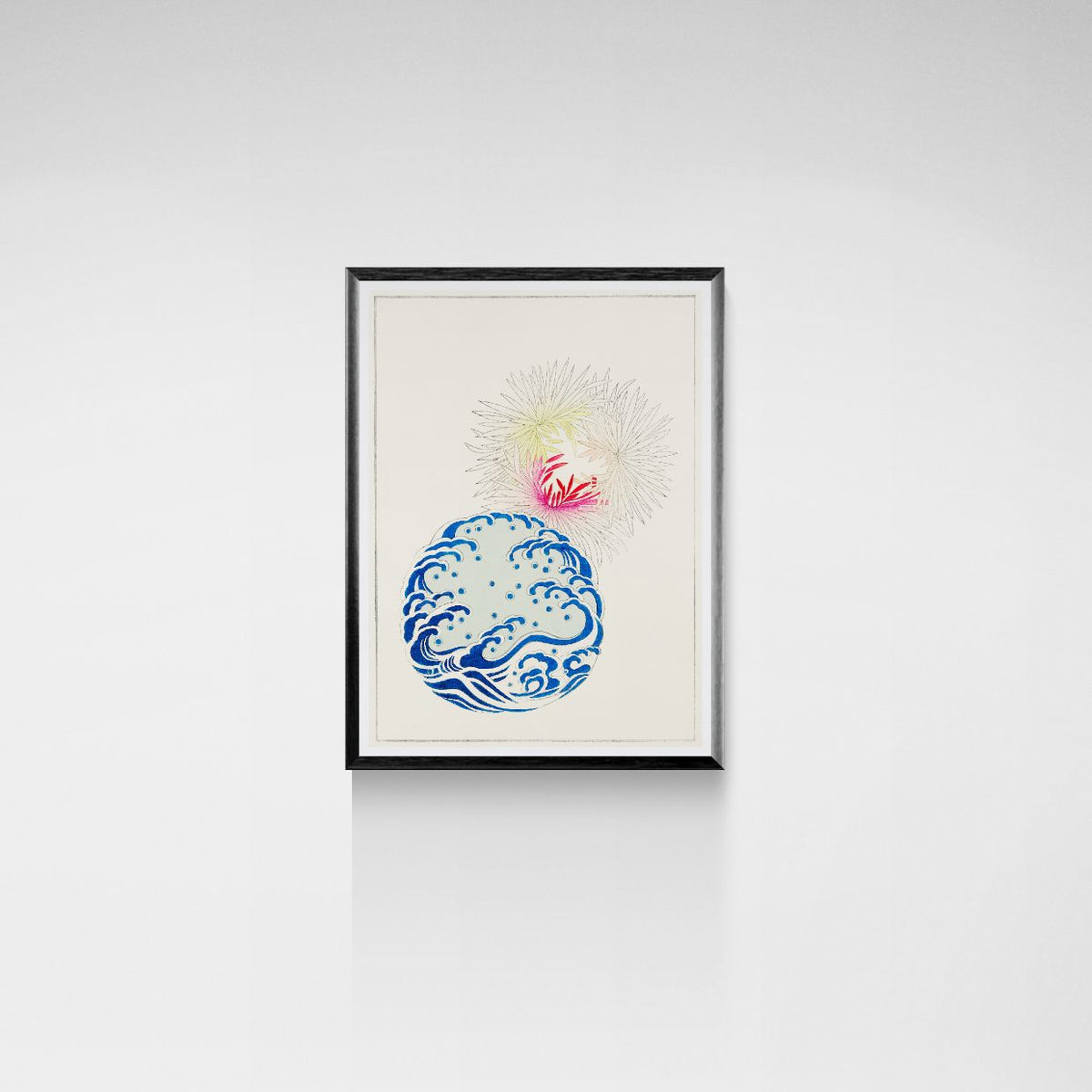 Framed artwork with a blue and pink design on a white wall