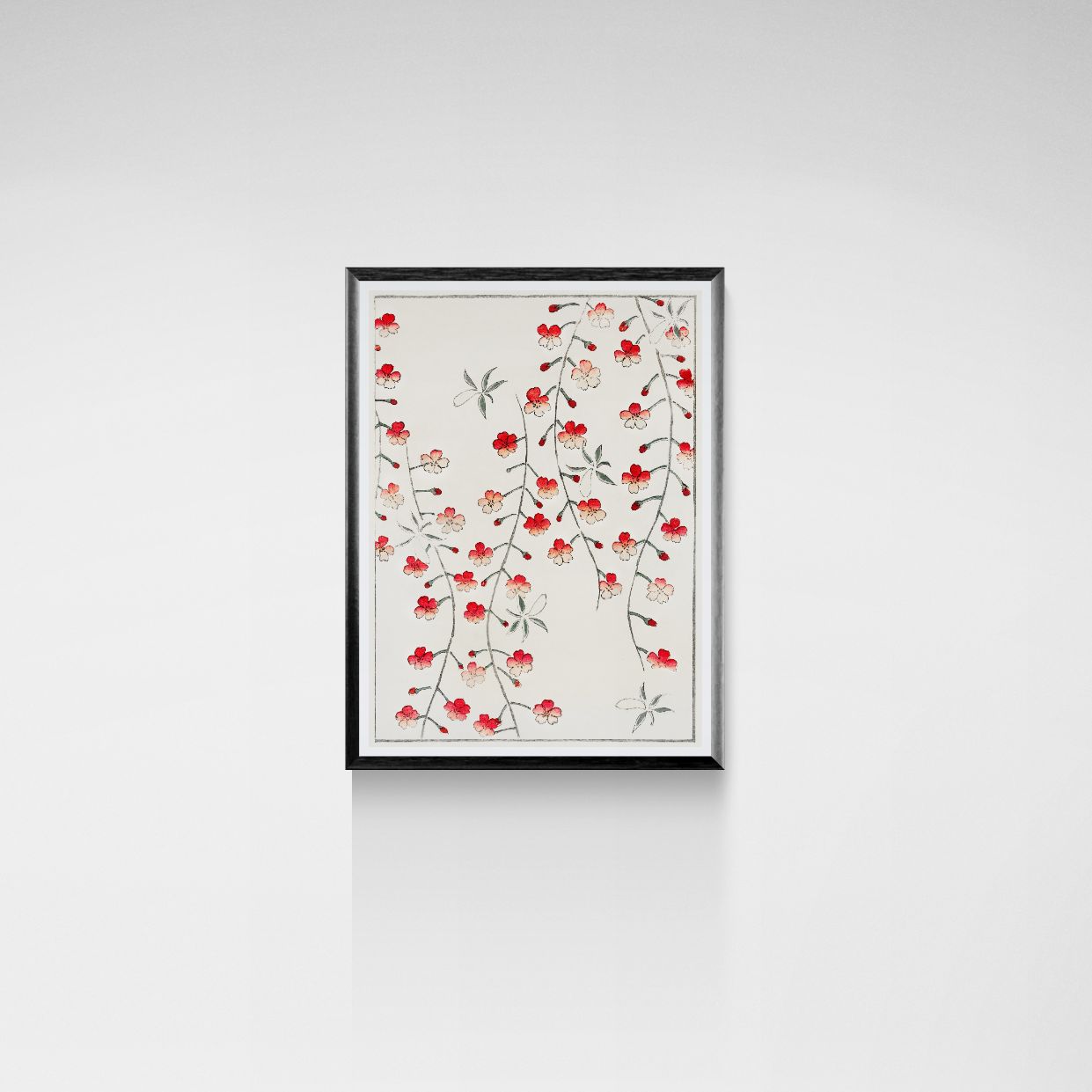 Framed artwork with red floral pattern on a white background