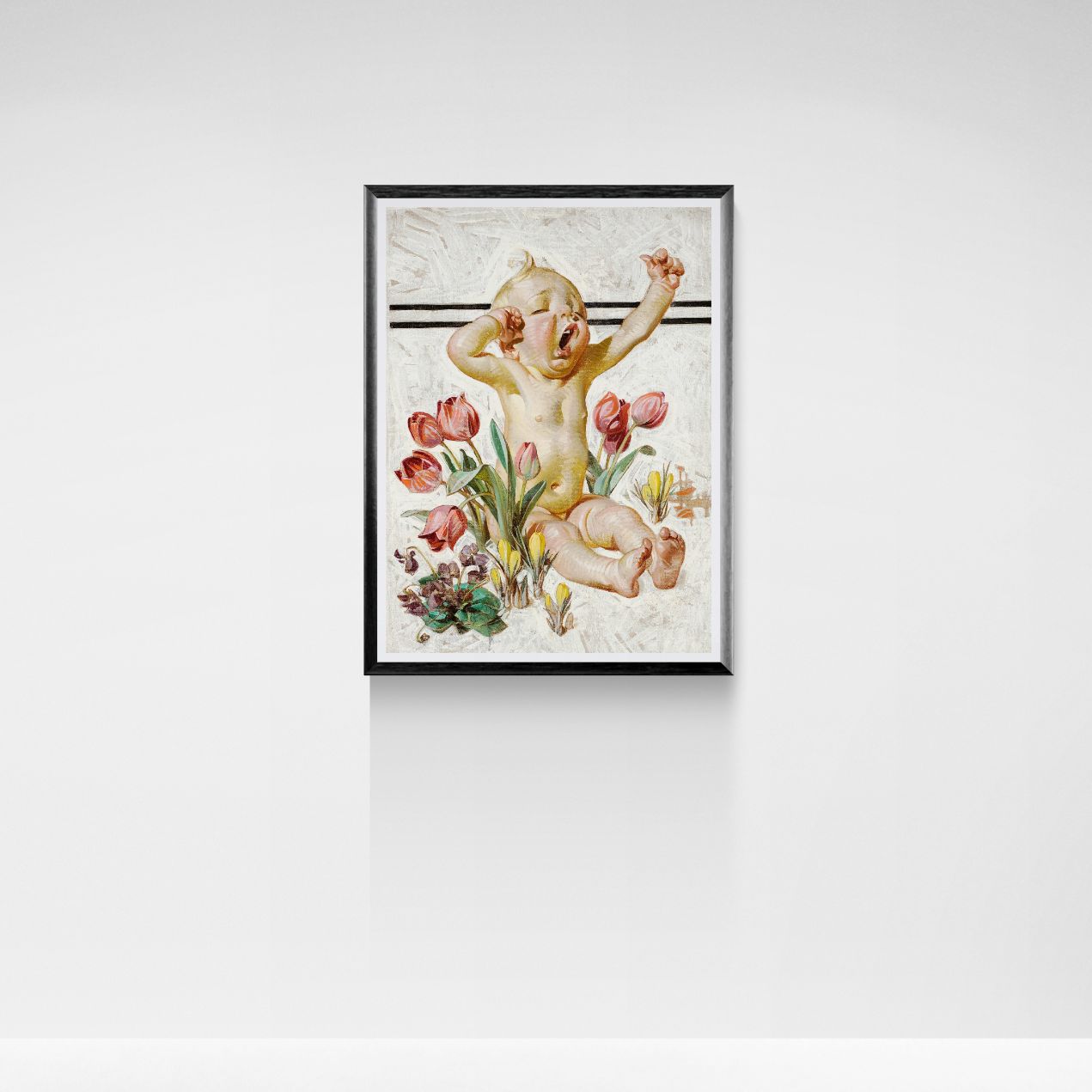Framed artwork of a baby surrounded by flowers on a white wall