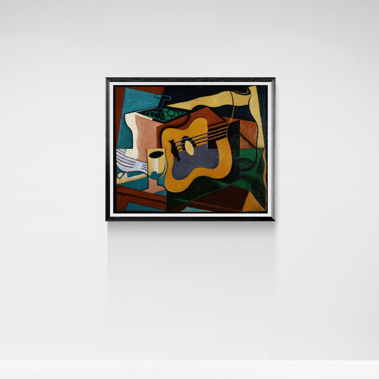 Framed abstract artwork of a guitar on a white wall