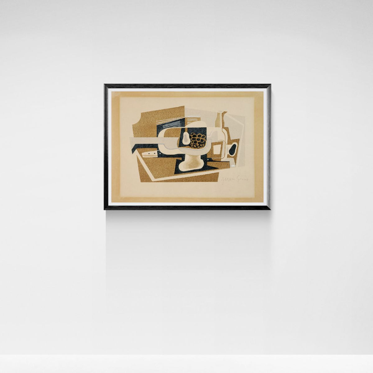 Framed cubism artwork on a white wall