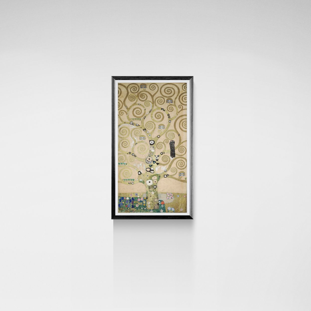 Framed artwork resembling 'The Tree of Life' by Gustav Klimt on a white wall.