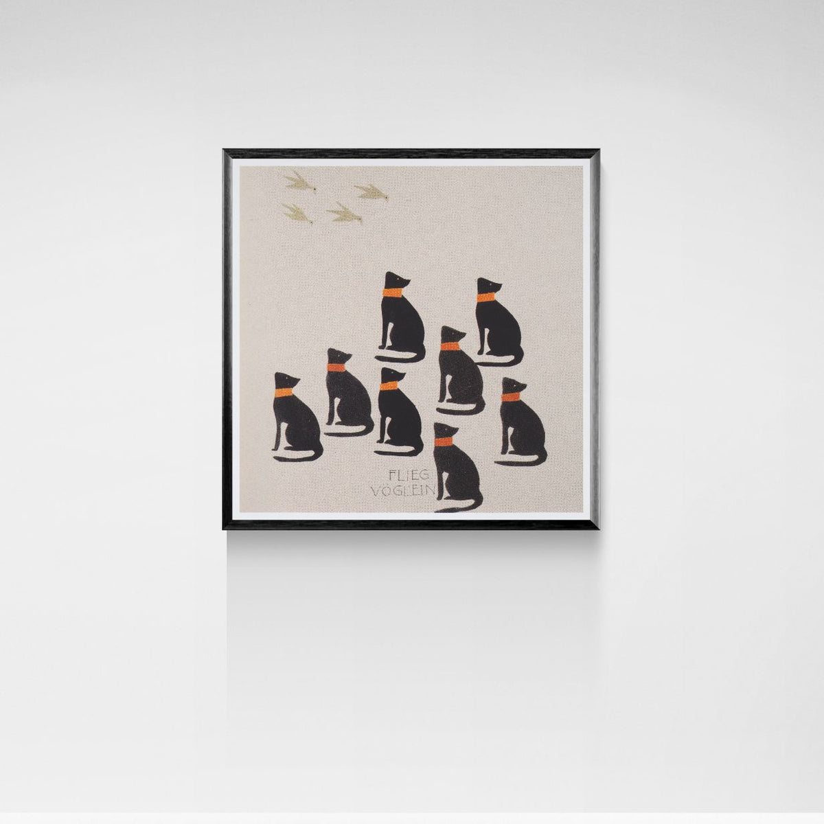 Framed artwork with illustrations of cats on a beige background
