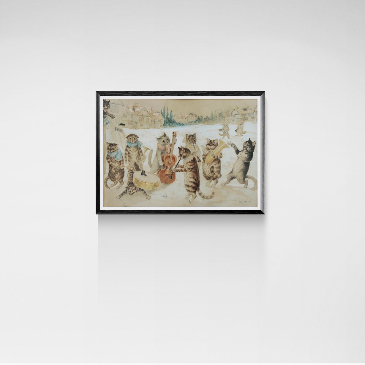 Framed artwork of cats playing musical instruments on a white wall