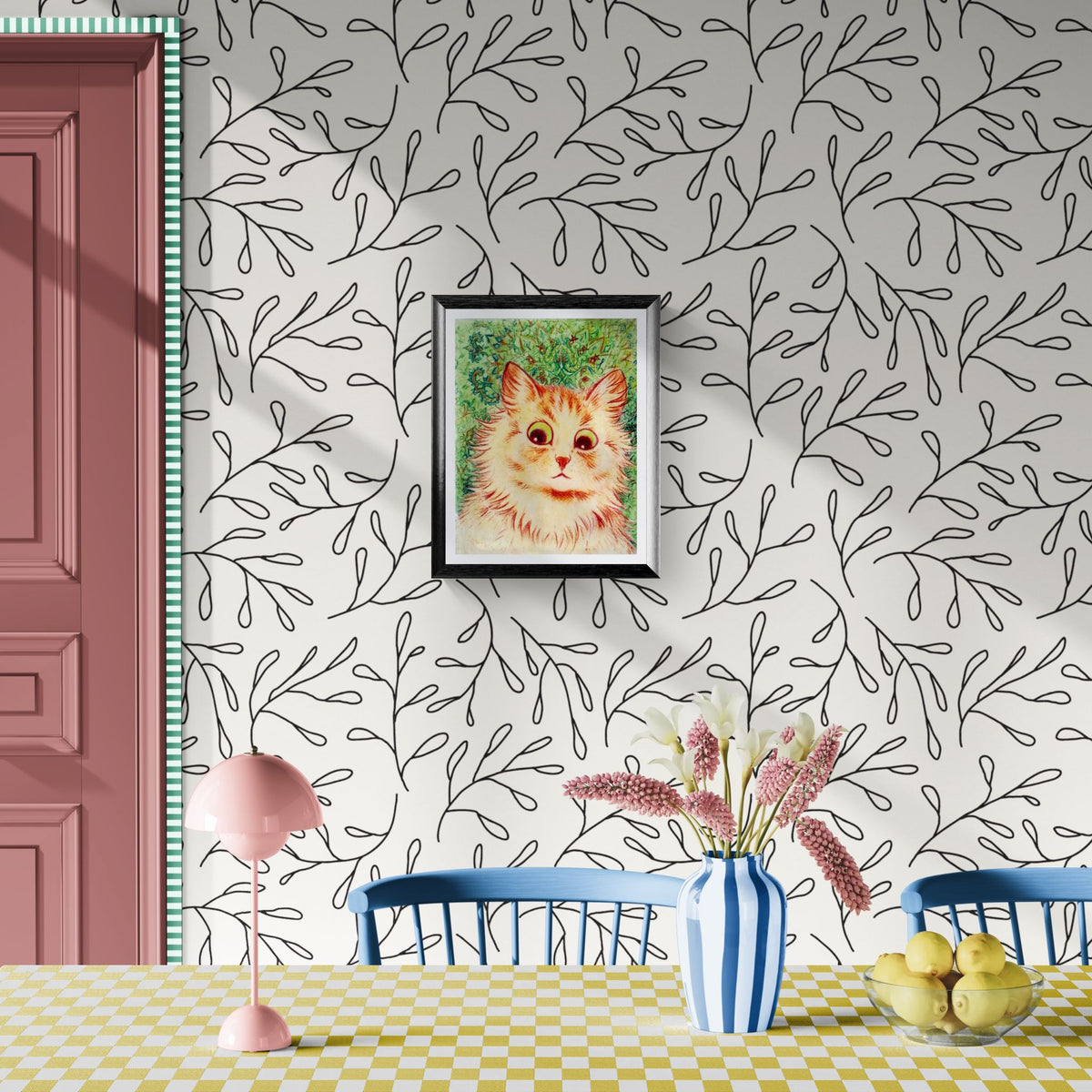 Dining room with floral-patterned wallpaper, framed cat painting, and decorative items on a table.