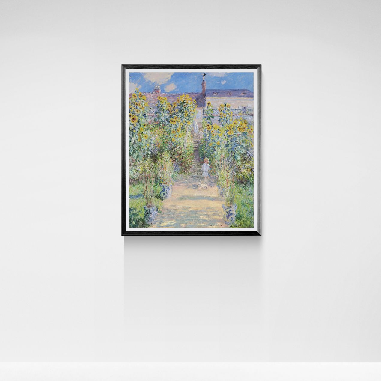 Framed artwork of a garden scene with sunflowers on a white wall
