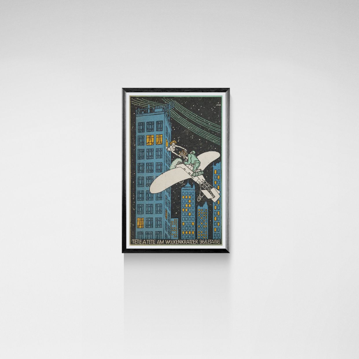 Framed artwork of a cityscape with a plane flying over buildings on a white wall.