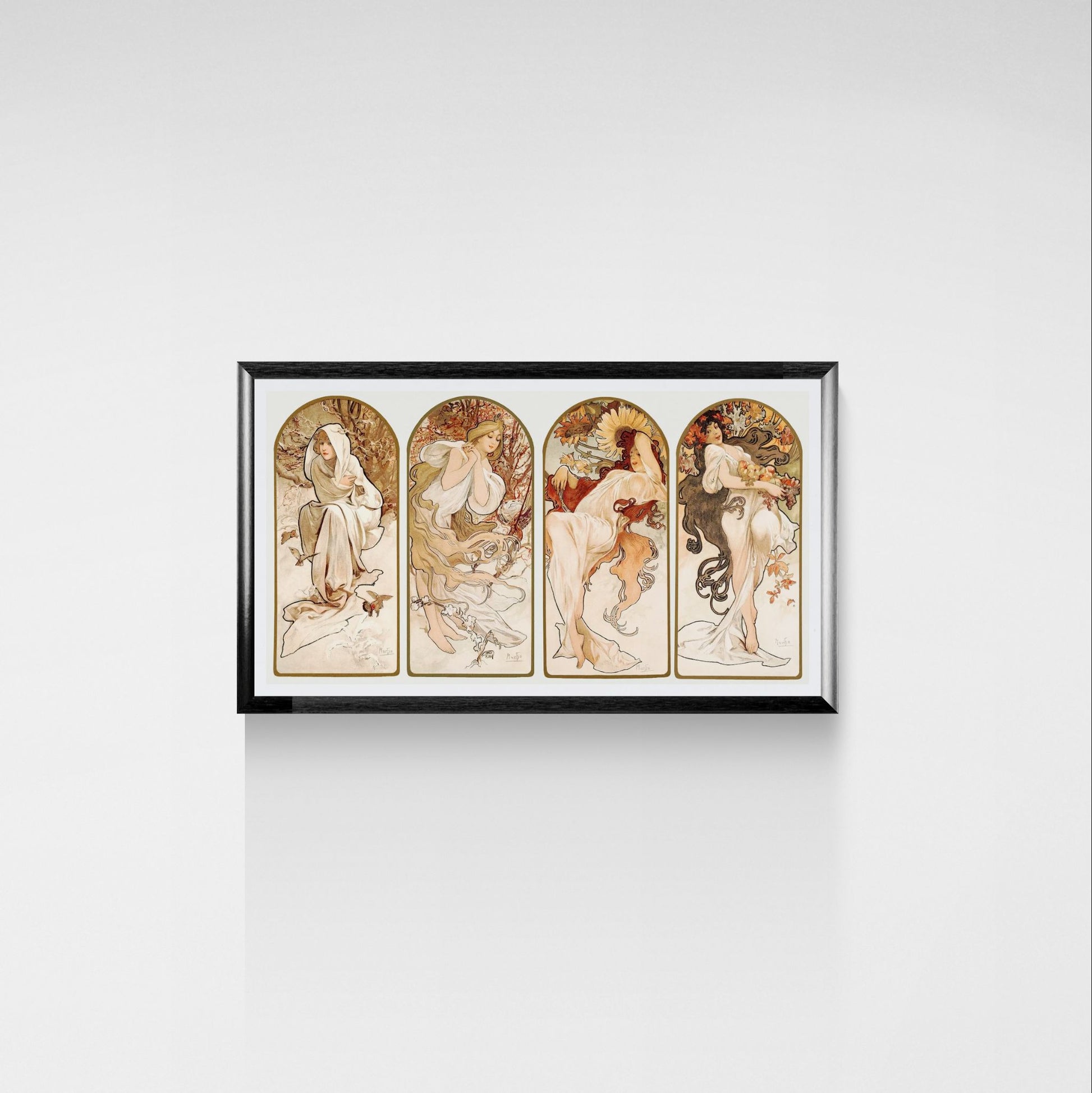 Framed artwork with four depicted women on a white wall