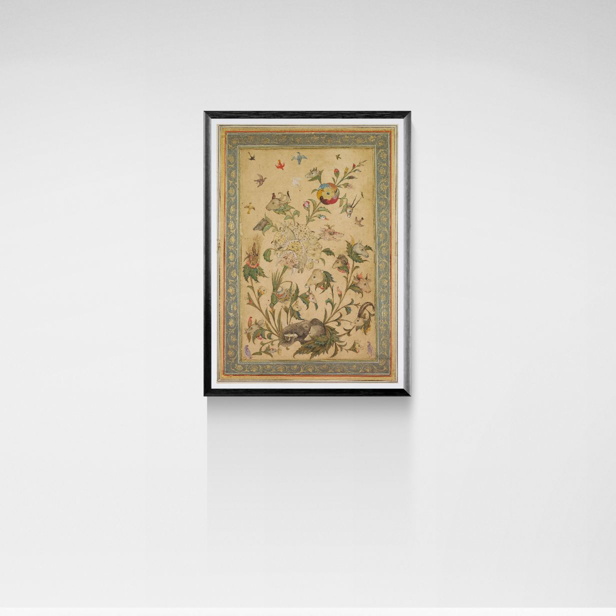 Framed artwork with floral and animal design on a white wall