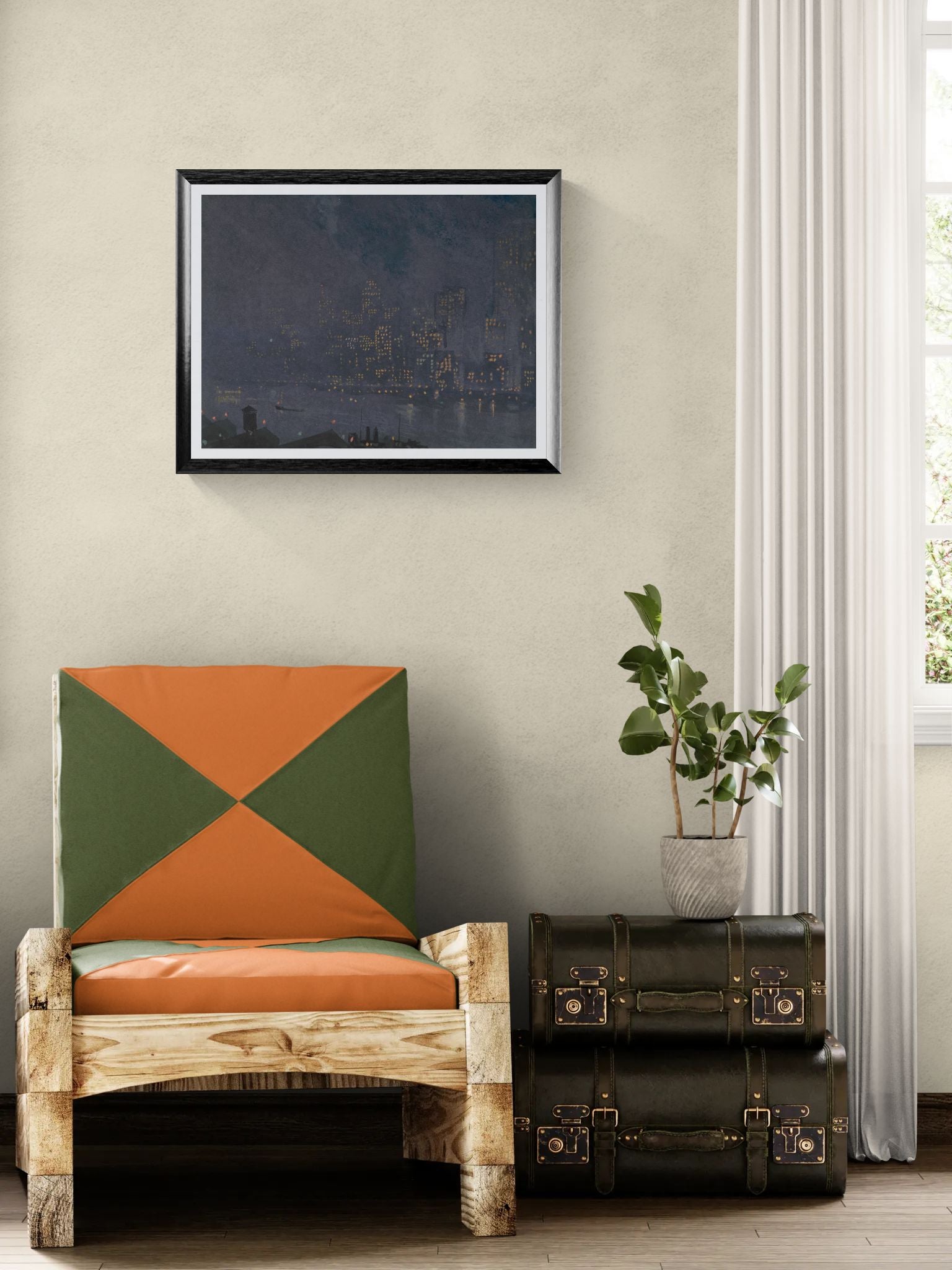 Chair with geometric cushion, black suitcase, and plant in a room with a framed picture on the wall.