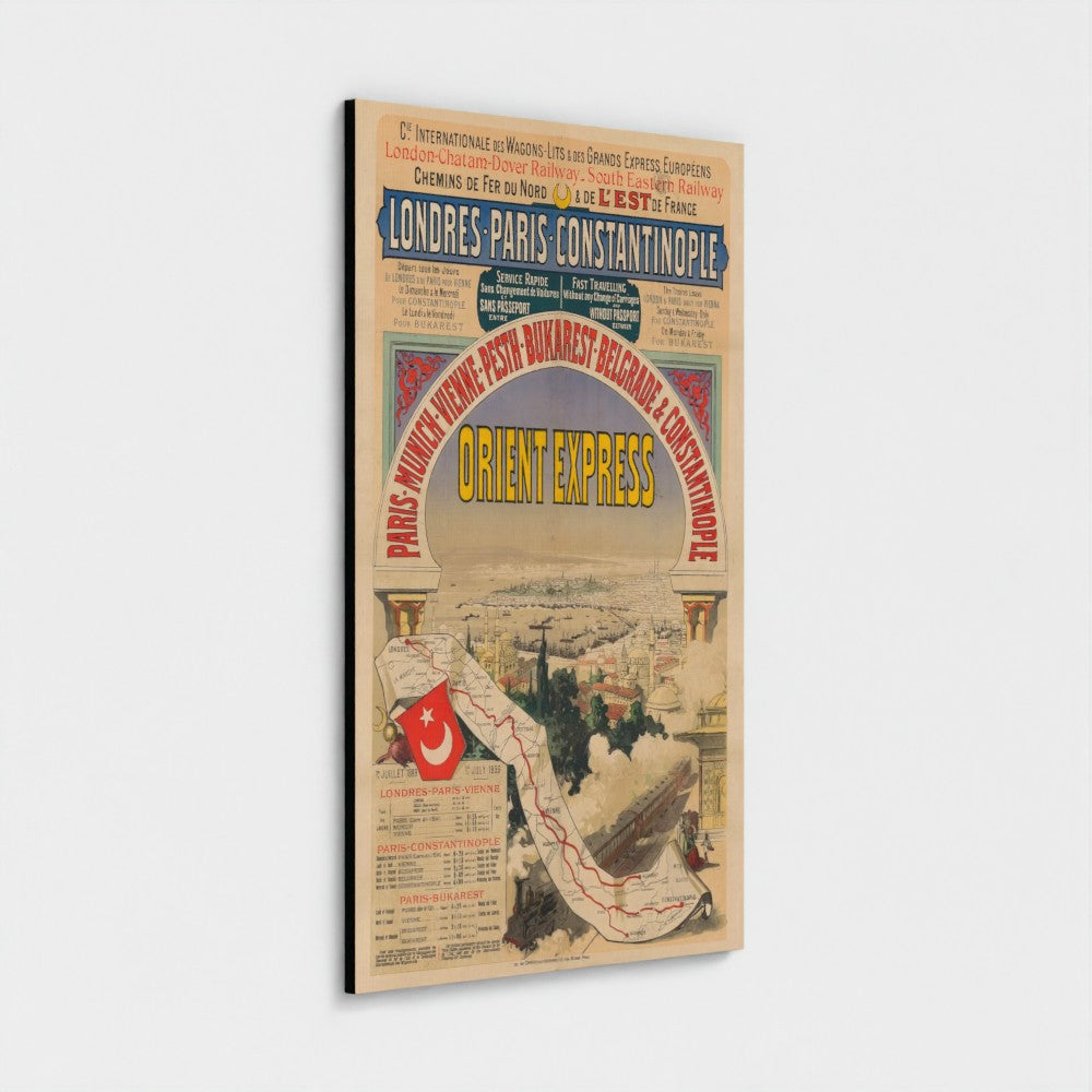 A vintage Orient Express travel poster print featuring illustrated cityscapes of London, Paris, Constantinople, and Istanbul, with prominent yellow and red typography on a beige background, shown hanging against a light gray wall.