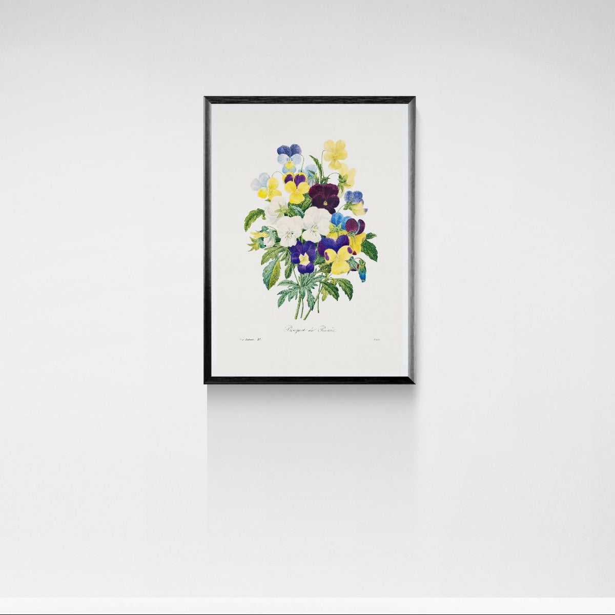 Framed artwork of a colorful floral arrangement on a white wall
