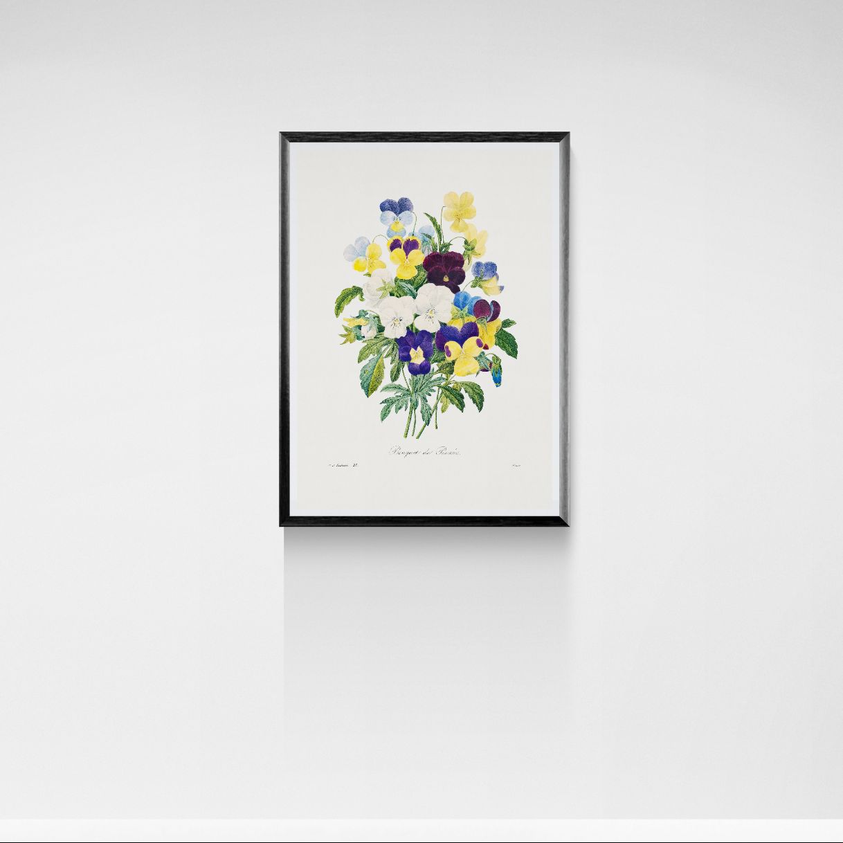 Framed artwork of a colorful floral arrangement on a white wall